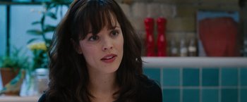 Movie still from “The Vow” (2012), directed by Michael Sucsy – A person sitting in front of a wall; Close Up shot, Over the shoulder angle