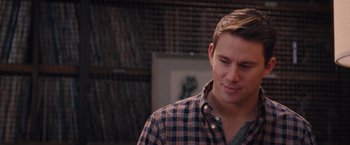 Movie still from “The Vow” (2012), directed by Michael Sucsy – A person wearing a plaid shirt; Close Up shot, Over the shoulder angle