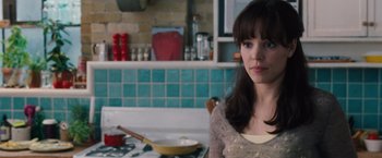 Movie still from “The Vow” (2012), directed by Michael Sucsy – A woman sitting at a sink in a kitchen; Close Up shot, Over the shoulder angle