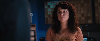 Movie still from “The Vow” (2012), directed by Michael Sucsy – A young woman is standing in front of a camera; Close Up shot, Over the shoulder angle