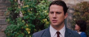 Movie still from “The Vow” (2012), directed by Michael Sucsy – A person wearing a suit and tie; Close Up shot, Over the shoulder angle