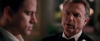 Movie still from “The Vow” (2012), directed by Michael Sucsy – A man in a tuxedo talking to another man in a suit; Close Up shot, Over the shoulder angle