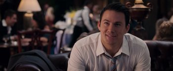 Movie still from “The Vow” (2012), directed by Michael Sucsy – A man in a white shirt and a blue and white tie; Close Up shot, Over the shoulder angle