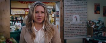 Movie still from “The Vow” (2012), directed by Michael Sucsy – A woman with long blonde hair wearing a white shirt and jacket; Close Up shot, Over the shoulder angle