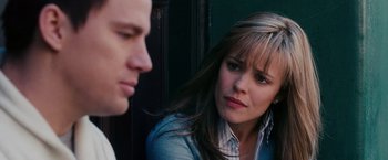 Movie still from “The Vow” (2012), directed by Michael Sucsy – A woman sitting next to a man in front of a building; Close Up shot, Over the shoulder angle