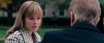 Movie still from “The Vow” (2012), directed by Michael Sucsy – A young woman and older man sitting in a park; Close Up shot, Over the shoulder angle
