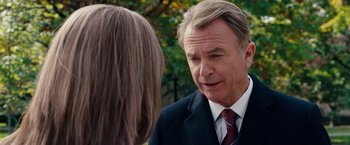 Movie still from “The Vow” (2012), directed by Michael Sucsy – An older man wearing a suit talking to a young woman; Close Up shot, Over the shoulder angle