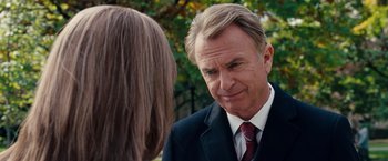 Movie still from “The Vow” (2012), directed by Michael Sucsy – A man in a suit and tie talking to a woman in a suit; Close Up shot, Over the shoulder angle