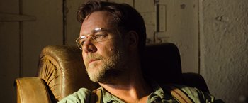 Movie still from “The Water Diviner” (2014), directed by Russell Crowe – A person wearing glasses and a beard; Close Up shot, Low angle