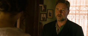 Movie still from “The Water Diviner” (2014), directed by Russell Crowe – A person in a room near a mirror; Close Up shot, Over the shoulder angle