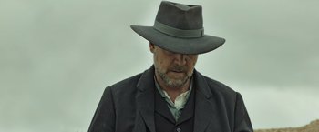 Movie still from “The Water Diviner” (2014), directed by Russell Crowe – An old man wearing a hat and a suit; Close Up shot, Low angle