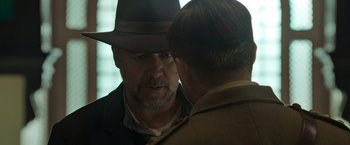 Movie still from “The Water Diviner” (2014), directed by Russell Crowe – A man wearing a hat talking to another man; Close Up shot, Over the shoulder angle