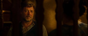 Movie still from “The Water Diviner” (2014), directed by Russell Crowe – A person wearing a vest; Close Up shot, Over the shoulder angle