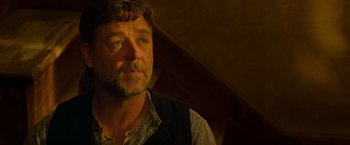 Movie still from “The Water Diviner” (2014), directed by Russell Crowe – A person wearing a vest; Close Up shot, Low angle