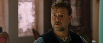 Movie still from “The Water Diviner” (2014), directed by Russell Crowe – A person with a beard; Close Up shot, Over the shoulder angle
