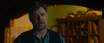 Movie still from “The Water Diviner” (2014), directed by Russell Crowe – A person wearing a vest; Close Up shot, Low angle