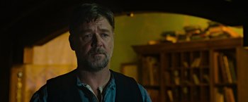 Movie still from “The Water Diviner” (2014), directed by Russell Crowe – A person wearing a vest; Close Up shot, Low angle