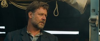 Movie still from “The Water Diviner” (2014), directed by Russell Crowe – A person wearing a suit and tie; Close Up shot, Low angle