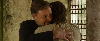 Movie still from “The Water Diviner” (2014), directed by Russell Crowe – A man and a woman hugging each other; Close Up shot, Over the shoulder angle