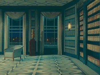Movie still from “The Wonderful Story of Henry Sugar” (2023), directed by Wes Anderson – An empty room with a couch and a chair in it; Extreme Wide shot, High angle