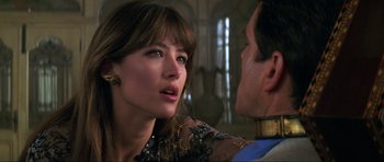 Movie still from “The World Is Not Enough” (1999), directed by Michael Apted – A man and a woman looking at one another; Close Up shot, Over the shoulder angle