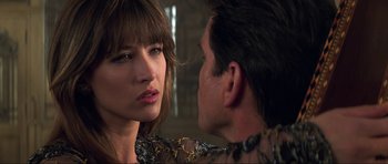 Movie still from “The World Is Not Enough” (1999), directed by Michael Apted – A man and a woman looking at one another; Close Up shot, Over the shoulder angle