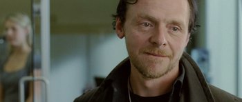 Movie still from “The World's End” (2013), directed by Edgar Wright – A person wearing a black jacket; Close Up shot, Over the shoulder angle