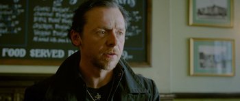 Movie still from “The World's End” (2013), directed by Edgar Wright – A person wearing a jacket; Close Up shot, Over the shoulder angle