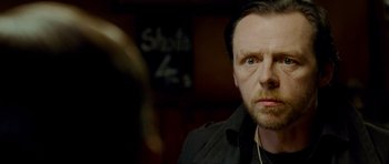 Movie still from “The World's End” (2013), directed by Edgar Wright – A person looking at the camera; Close Up shot, Over the shoulder angle