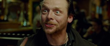 Movie still from “The World's End” (2013), directed by Edgar Wright – A person making a funny face; Close Up shot, Low angle