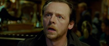 Movie still from “The World's End” (2013), directed by Edgar Wright – A person with long hair; Close Up shot, Over the shoulder angle