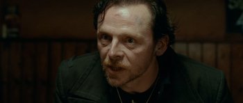 Movie still from “The World's End” (2013), directed by Edgar Wright – A person with a beard; Close Up shot, Over the shoulder angle