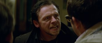 Movie still from “The World's End” (2013), directed by Edgar Wright – A person with a beard; Close Up shot, Over the shoulder angle