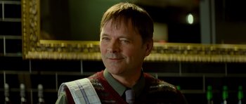 Movie still from “The World's End” (2013), directed by Edgar Wright – A person wearing a sweater; Close Up shot, Low angle