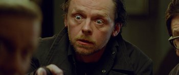 Movie still from “The World's End” (2013), directed by Edgar Wright – A person with his eyes wide open; Close Up shot, Low angle