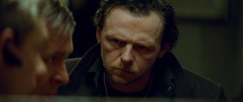 Movie still from “The World's End” (2013), directed by Edgar Wright – A person wearing a jacket; Close Up shot, Over the shoulder angle