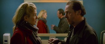Movie still from “The World's End” (2013), directed by Edgar Wright – A man and a woman in front of a bathroom mirror; Close Up shot, Over the shoulder angle
