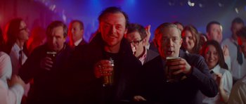 Movie still from “The World's End” (2013), directed by Edgar Wright – A group of men standing next to each other holding drinks; Close Up shot, Over the shoulder angle