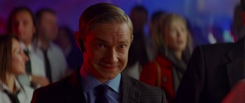 Movie still from “The World's End” (2013), directed by Edgar Wright – A person wearing a suit and tie; Close Up shot, Over the shoulder angle