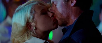Movie still from “The World's End” (2013), directed by Edgar Wright – A man and a woman kissing each other; Extreme Close Up shot, Low angle