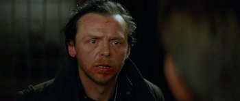 Movie still from “The World's End” (2013), directed by Edgar Wright – A person wearing a black jacket; Close Up shot, Over the shoulder angle