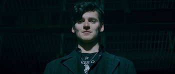 Movie still from “The World's End” (2013), directed by Edgar Wright – A man with a beard wearing a black jacket; Close Up shot, Low angle