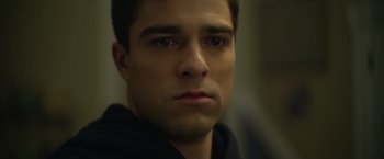 Movie still from “There's Someone Inside Your House” (2021), directed by Patrick Brice – A young man's face; Close Up shot, Low angle