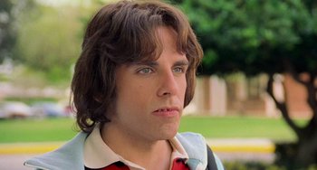 Movie still from “There's Something About Mary” (1998), directed by Bobby Farrelly – A person with long brown hair; Close Up shot, Low angle