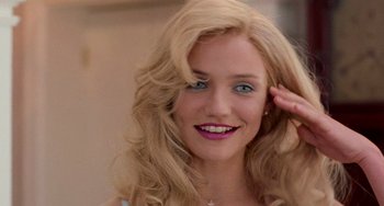 Movie still from “There's Something About Mary” (1998), directed by Bobby Farrelly – A person with blond hair; Close Up shot, Over the shoulder angle