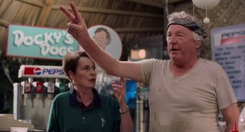 Movie still from “There's Something About Mary” (1998), directed by Bobby Farrelly – An older man and a younger woman are talking; Medium shot, Over the shoulder angle