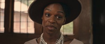 Movie still from “They/Them” (2022), directed by John Logan – A person wearing a hat; Close Up shot, Over the shoulder angle