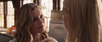 Movie still from “They/Them” (2022), directed by John Logan – Two women are talking to each other in a room; Close Up shot, Over the shoulder angle