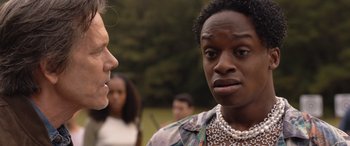 Movie still from “They/Them” (2022), directed by John Logan – A man and a woman talking to each other; Close Up shot, Over the shoulder angle