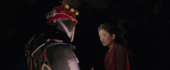 Movie still from “Thirteen Lives” (2022), directed by Ron Howard – Two young boys are talking in a cave; Close Up shot, Over the shoulder angle